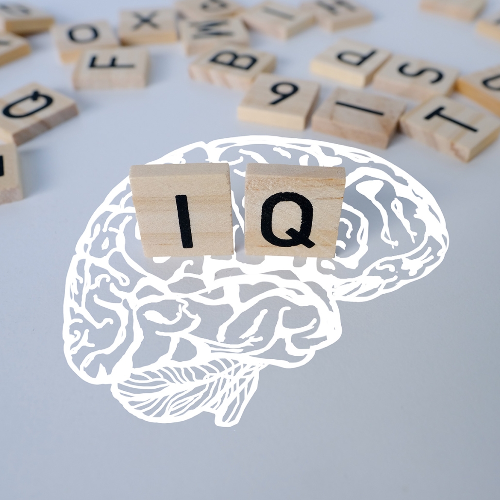 drawing of a brain with IQ in scrabble letters